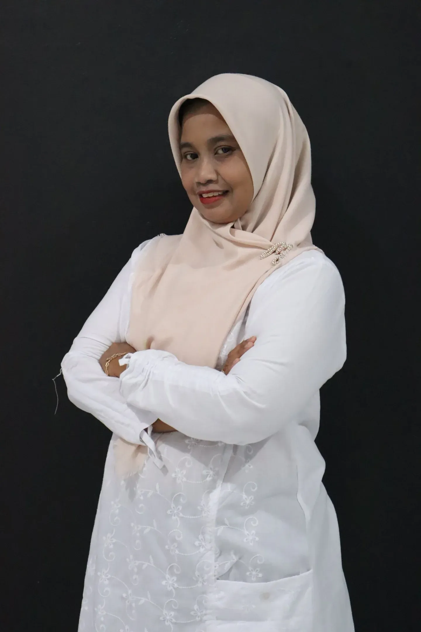 Portrait of Dewi Elliana, SKM, S.Tr.Keb, M.Kes